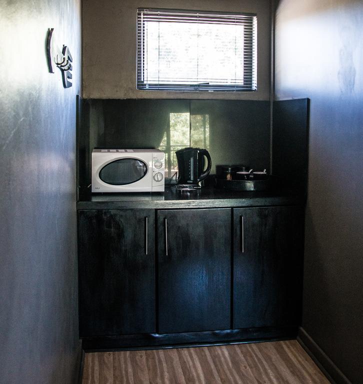Altissimo Guesthouse Bloemfontein Rom bilde