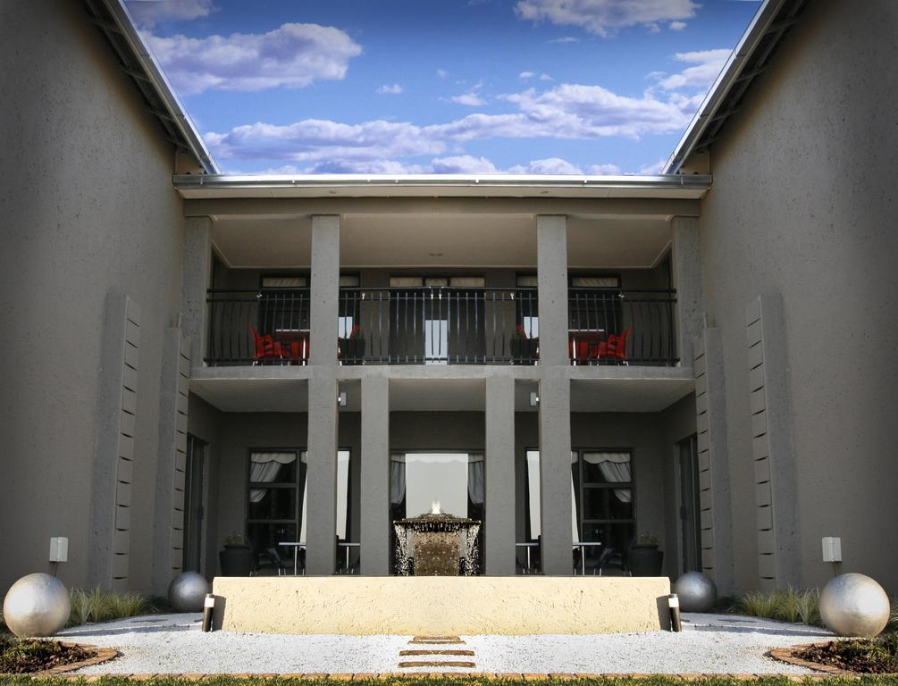 Altissimo Guesthouse Bloemfontein Rom bilde